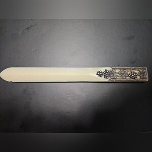 vintage or antique letter opener (also known as a paper knife or page turner)